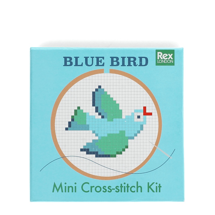 Beginner cross-stitch kit with blue bird design, hoop, needle, fabric and thread.