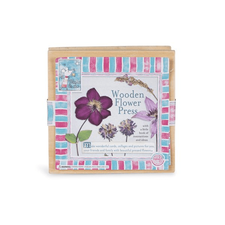 Compact wooden flower press measuring 10 × 10 × 3.3cm, with instruction booklet.