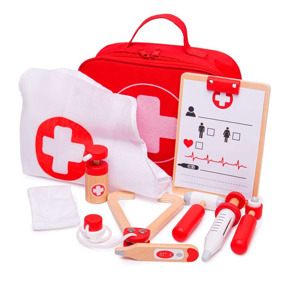 Red fabric doctor's bag with wooden stethoscope, thermometer, syringe and other medical play pieces