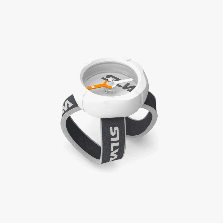 Child-sized wrist compass with rubber housing.